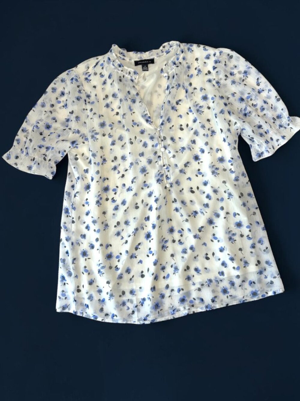 Tamara H. white blouse w/blue flowers